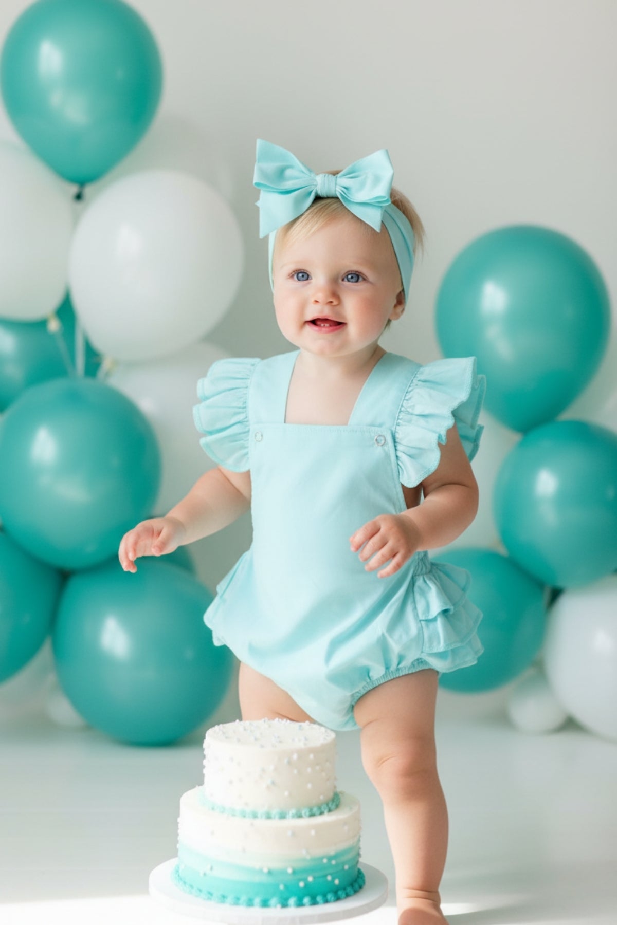 Bezaubernde Baby Salopette - Türkis - mit Haarband