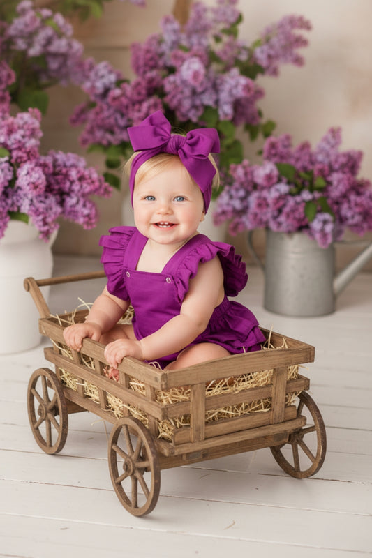 Zauberhafte Baby Salopette - lila - mit Haarband