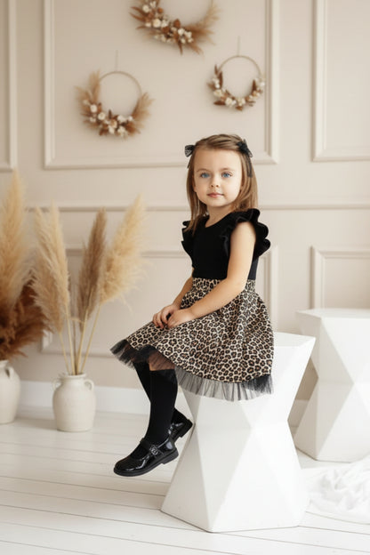 Tütükleid schwarz mit Leopardenmuster - Kleid mit Rüschensaum und Haarspange